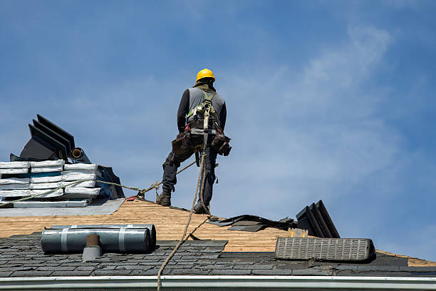 Professional Roof Replacement technician working in Caledonia, WI
